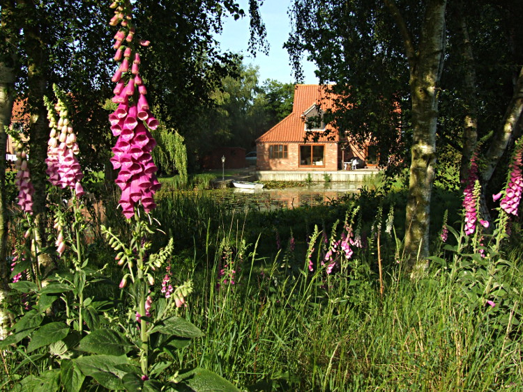 Ruston House from beyond
	the site of the Summerhouse